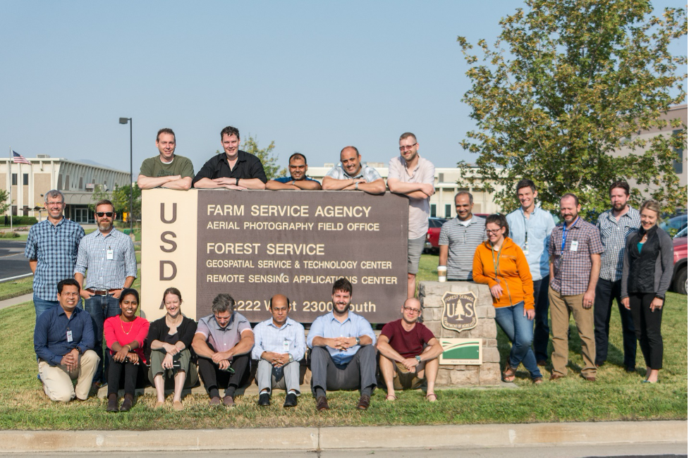 Team in front of USDA sign