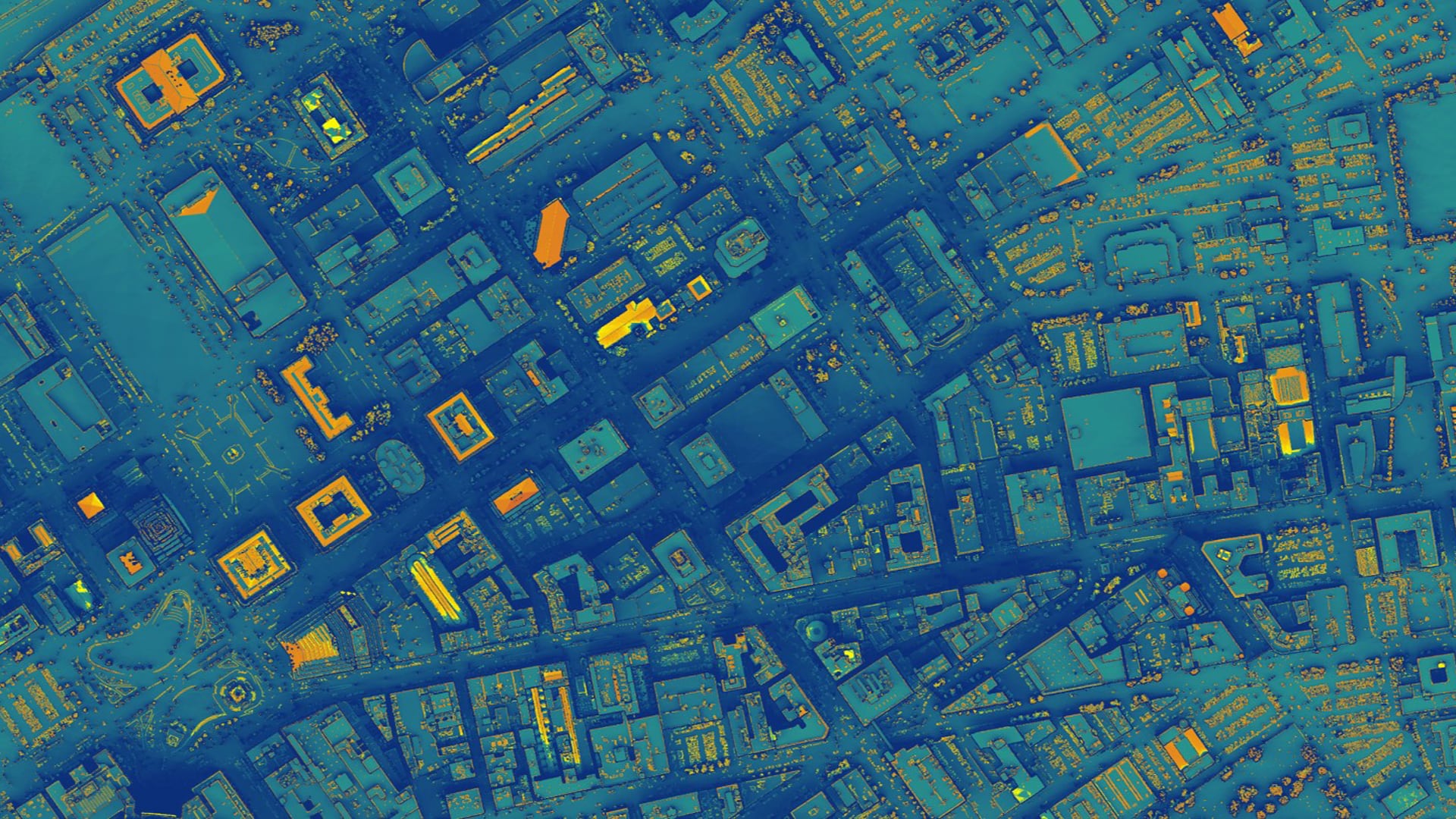 Annual solar energy generation potential calculated using NASA POWER (preprocessed CERES and MODIS data from the Aqua and Terra satellites) in downtown Cleveland, OH. Solar irradiation data are averaged over 22 years (1983 to 2005). LiDAR data were used to model shadowing and the number of sunlight exposure hours per year. Warm colors indicate high solar energy generation potential per square foot. Unshaded rooftops with slopes and aspects that correspond with local solar geometry are optimal for installing solar panels.