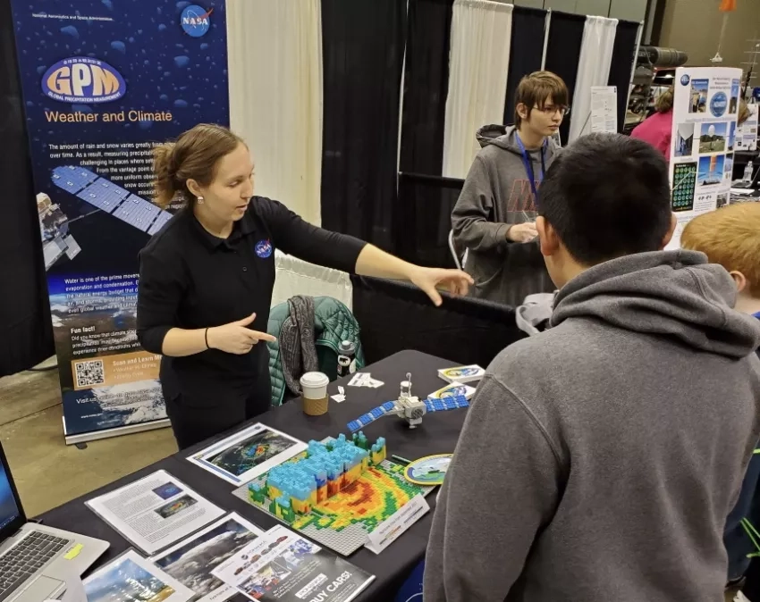 Photo of science outreach coordinator Andrea Portier at outreach event