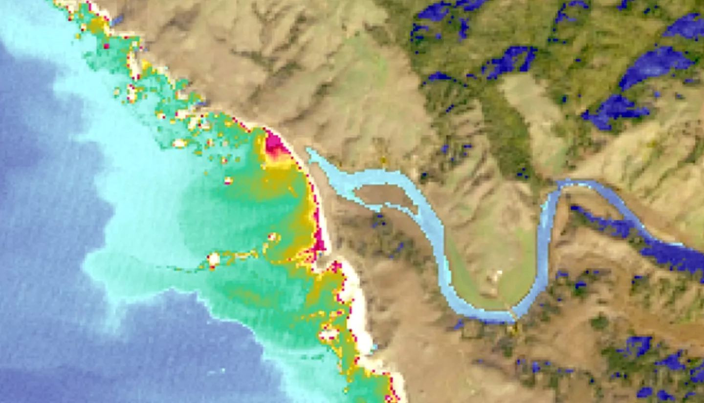 Turbidity calculated from Landsat 8 OLI imagery taken 01/23/2021 over Russian River, California. A turbidity algorithm was applied to visualize water quality and mask out land. In areas of water, red indicates high turbidity and blue indicates low turbidity. Land is displayed with a true color band combination (4, 3, 2) where dark blue indicates shadow. As turbidity can indicate poor water quality, visualization informs conservation agencies on estuary conditions.  Keywords: Image created by Roger Ly. Keywords: turbidity, water quality monitoring, California, estuary
