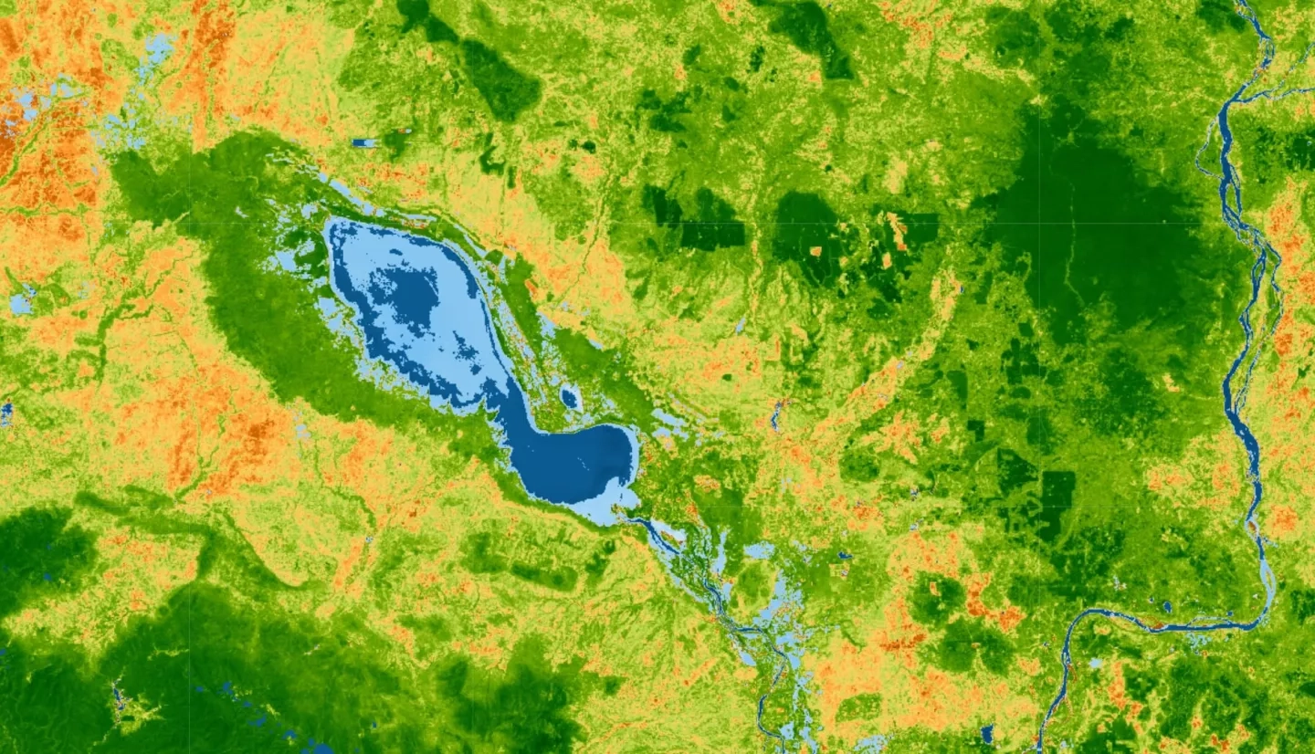 NDVI and NDWI-processed imagery of the Tonlé Sap Lake region within Cambodia using 2020 Landsat 8 OLI bands 3, 4, and 5. The NDVI color ramp ranges from hues of orange representing built environments to darker hues of green indicating healthy vegetation. NDWI denotes flood stage lake level extent in lighter shades of blue with deeper shades of blue indicating lake low point during the dry season.  Keywords: NDVI, NDWI, Water Mask, Vegetation, Landsat 8