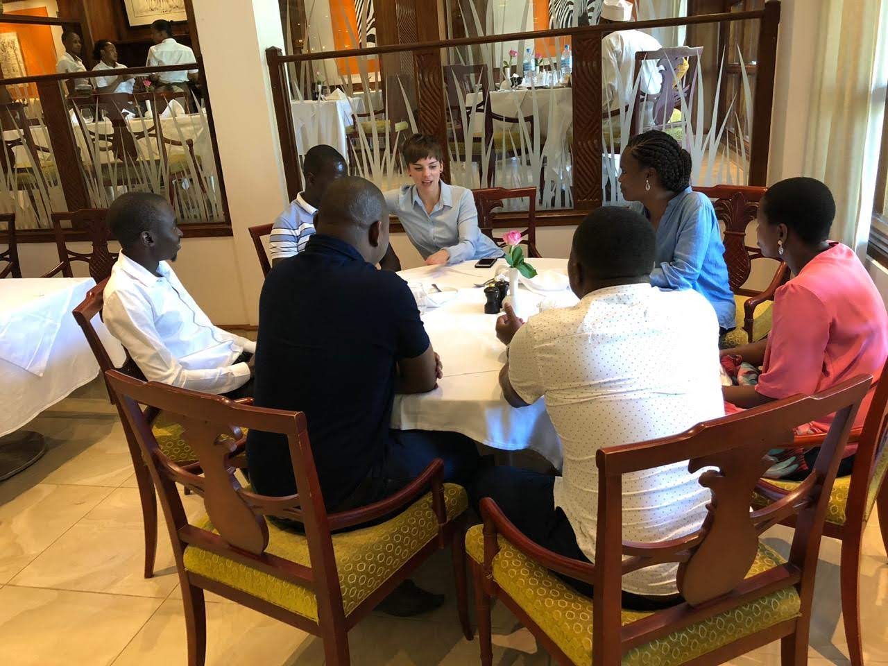 Photo of Andi Thomas meeting with people in Tanzania