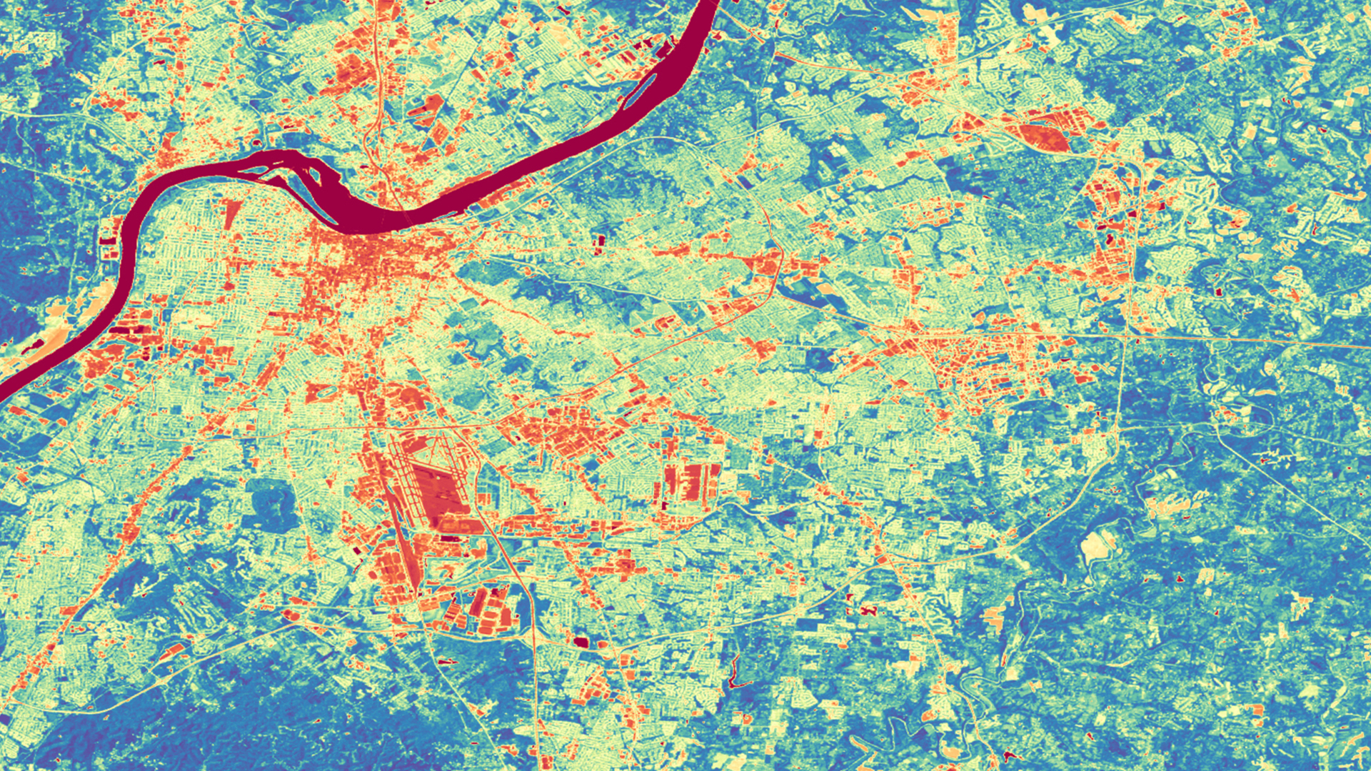 NDVI-processed imagery using 2019 Landsat 8 OLI data for the city of Louisville, Kentucky. Blue indicates high positive NDVI values, red indicates low negative values, and yellow indicates values close to 0. Areas with NDVI values close to and below 0 tend to have little vegetation which may be high priority areas for greening initiatives.  Keywords: Greenness, NDVI