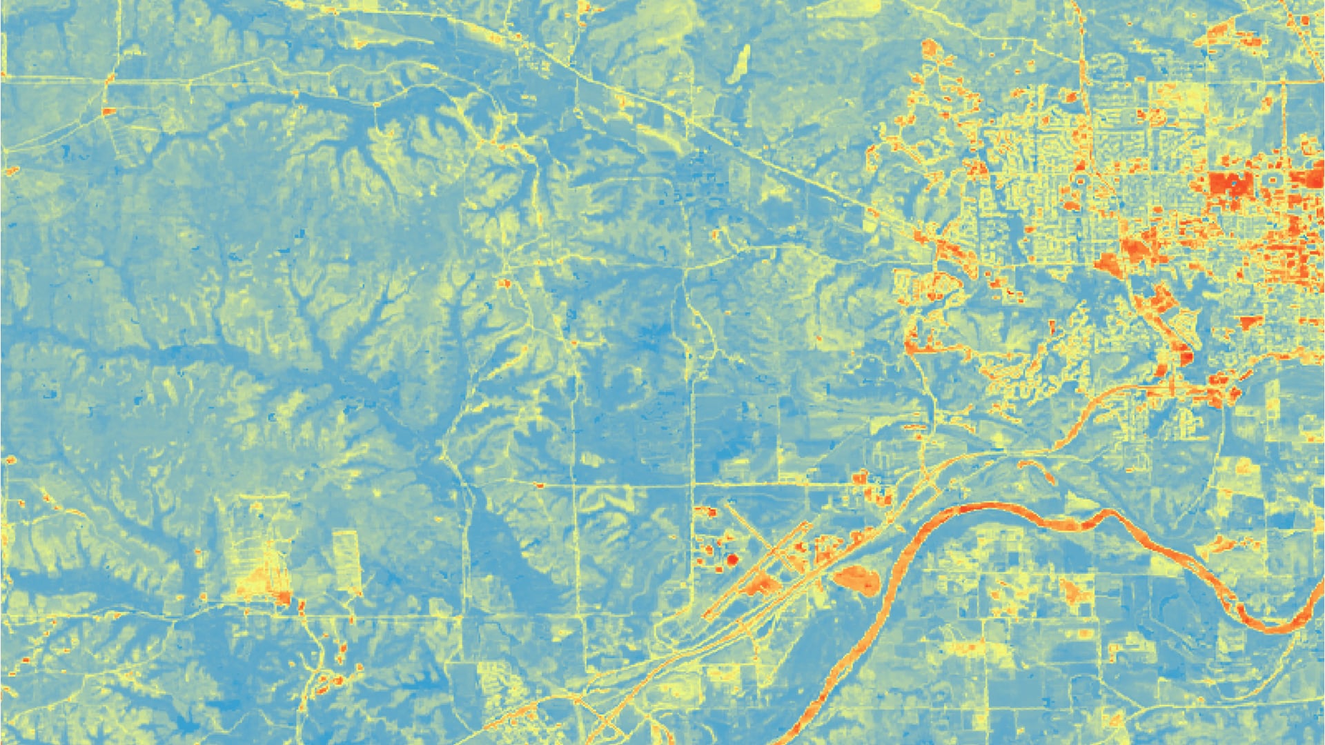 Curve number runoff calculated from NDVI-processed imagery using 2019 Landsat 8 OLI data. The southern portion of the county, with the City of Manhattan to the east, is displayed. Blue shades indicate lower runoff and red shades indicate higher runoff. Local stakeholders could expect more flooding to occur where there is higher runoff and should focus on these areas during resiliency planning.   Keywords: curve number runoff, NDVI, land use change, Trista Brophy, Ella Griffith, Elizabeth Nguyen, Adelaide Schmidt​