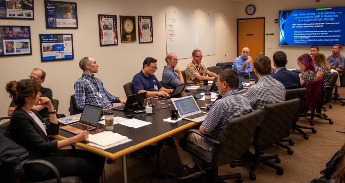 A working group meeting at the floods and landslides modeling and monitoring workshop. Credit: NASA