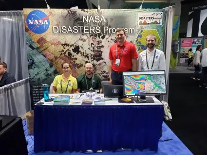 Photo of the Disasters program area booth at the 2019 Esri user conference