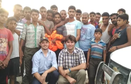 Photo of Vernier (kneeling, front row, center) with crowd of locals during recovery of a payload near Varanasi, India, that was launched in August 2016 for the BATAL balloon campaign.
