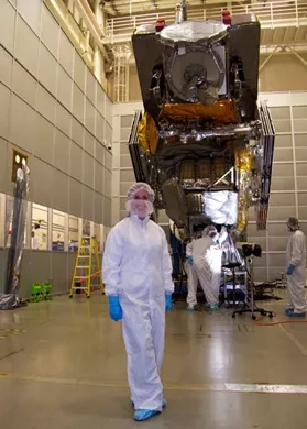 Dr. Kirschbaum poses in front of a fully assembled Global Precipitation Measurement (GPM) Core Observatory spacecraft at NASA’s Goddard Space Flight Center. Credits: Dalia Kirschbaum