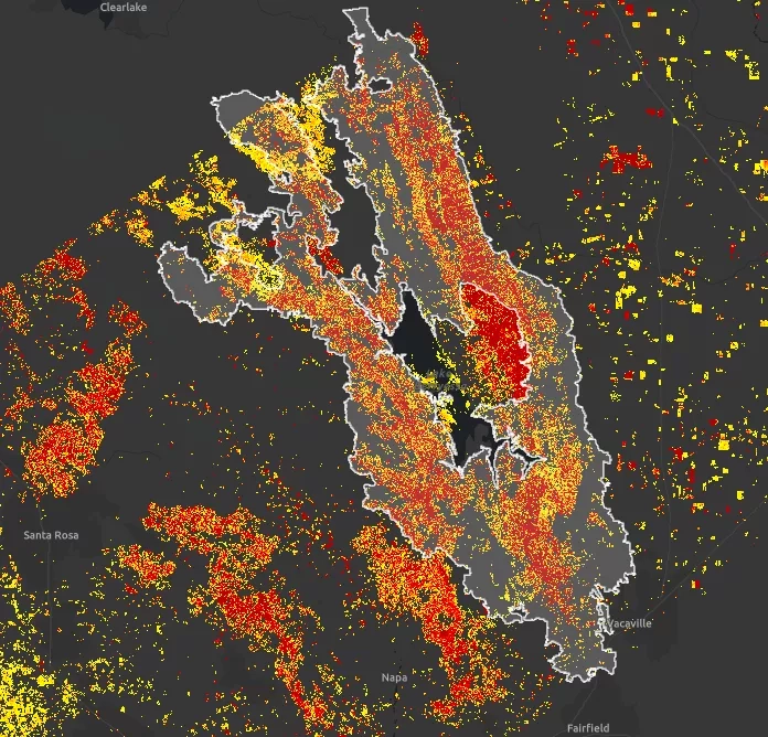 Damage Proxy Map of the LNU Lightning Complex fires showing likely damaged areas in red and yellow. The map was generated by comparing airborne UAVSAR data collected before (October 2nd & 3rd, 2018) and during (September 3rd, 2020) the fires. The white outline indicates the perimeter of the LNU Lightning Complex fire as of September 11th as determined by the National Interagency Fire Center (NIFC) – this perimeter aids in differentiating current from historical fire damage and potential false positives in t