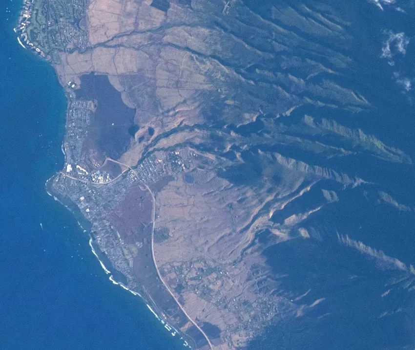 An astronaut photograph showing damage to Lahaina, Maui, on Aug. 12, 2023. Note that the upper right of the images shows clouds, not wildfire smoke. This image was cropped and enhanced to better illustrate the damaged areas. Credits: NASA International Space Station