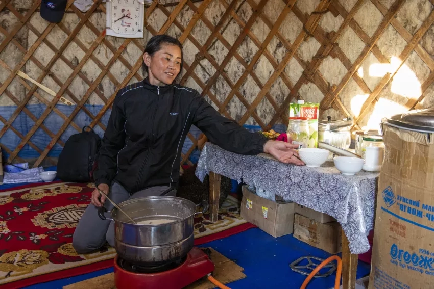 photo of woman in Mongolia cooking