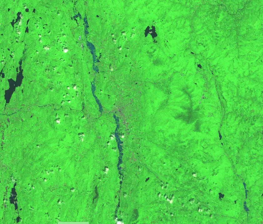 Shortwave infrared imagery of Vermont from the European Space Agency's (ESA) Copernicus Sentinel-2A/2B satellites on July 12, 2023. In the image, areas of water appear blue, healthy green vegetation appear as a bright green, and urban areas in various shades of magenta. Data such as this can be used to assess the extent of flood waters. Credits: NASA MSFC 2023, contains modified Copernicus Sentinel data 2023, processed by ESA.