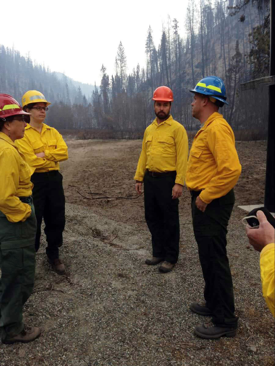 Katherine Rowden (second from left) at the post-fire scar of the Okanogan Complex Fire.