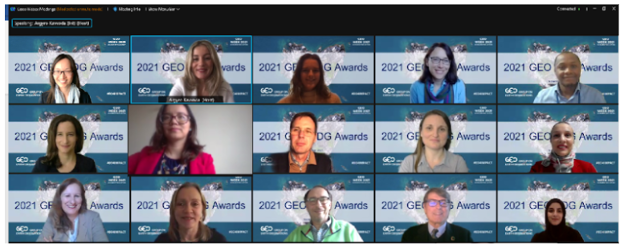 screenshot of 15 people smiling on a video conference