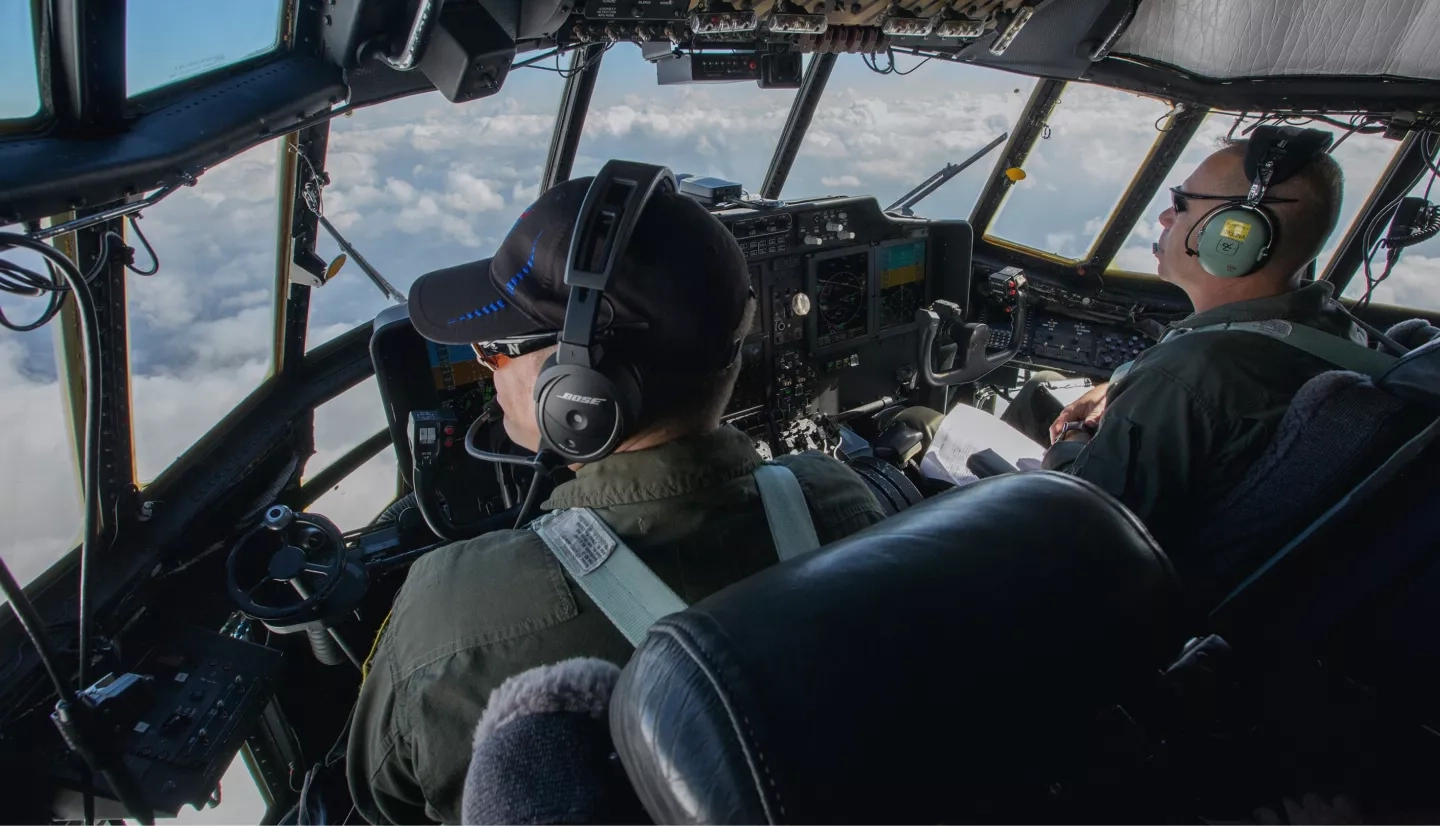 C-130 pilots Jim Lawson, left, and Paul Pinaud during a flight.