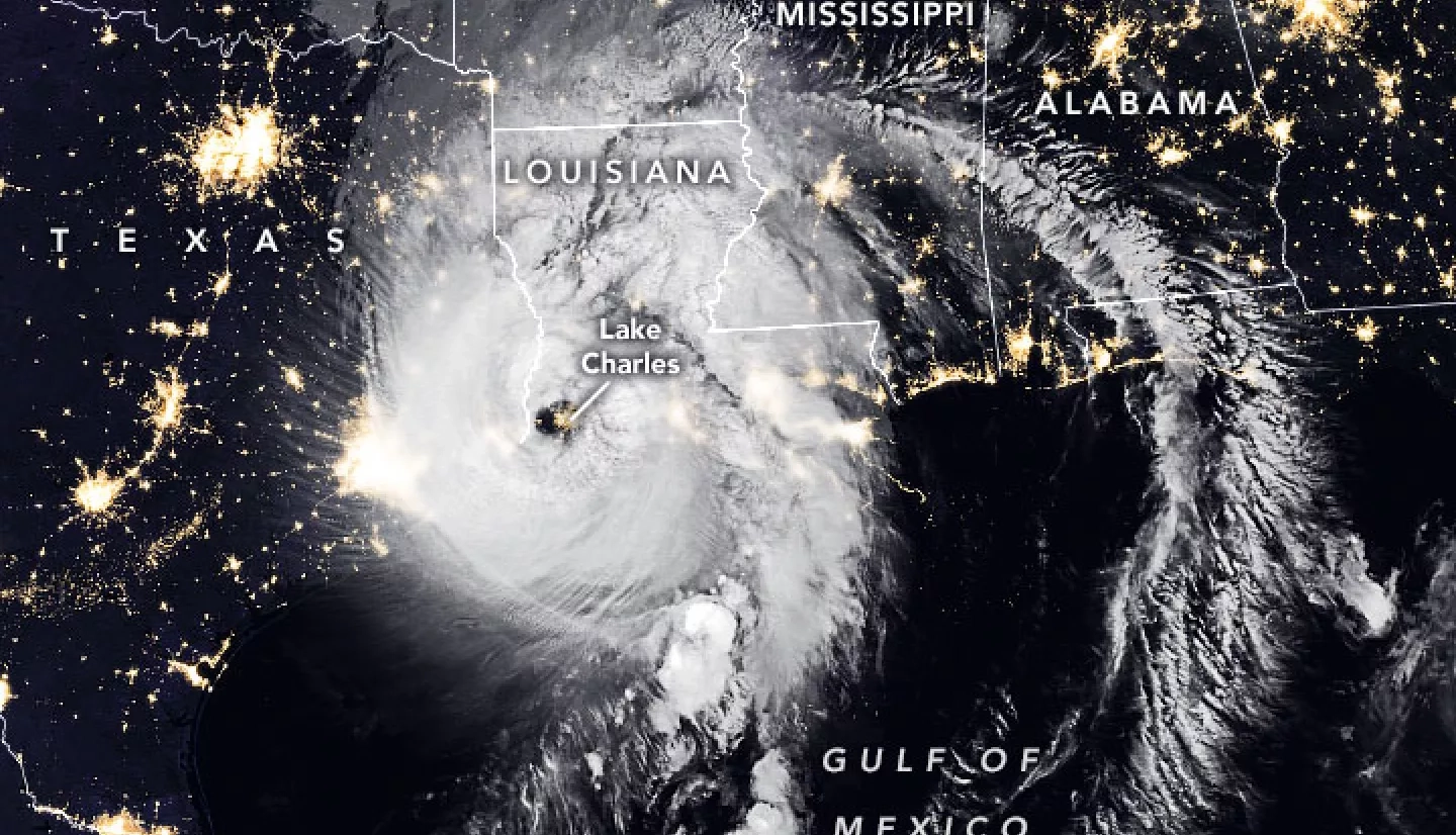 The Visible Infrared Imaging Radiometer Suite (VIIRS) onboard the NOAA-20 satellite acquired this image of Hurricane Laura at 2:50 a.m. CT on August 27, 2020, about two hours after the storm made landfall. Clouds are shown in infrared using brightness temperature data, which is useful for distinguishing cooler cloud structures from the warmer surface below. That data is overlaid on composite imagery of city lights from NASA’s Black Marble dataset. Credit: NASA Earth Observatory