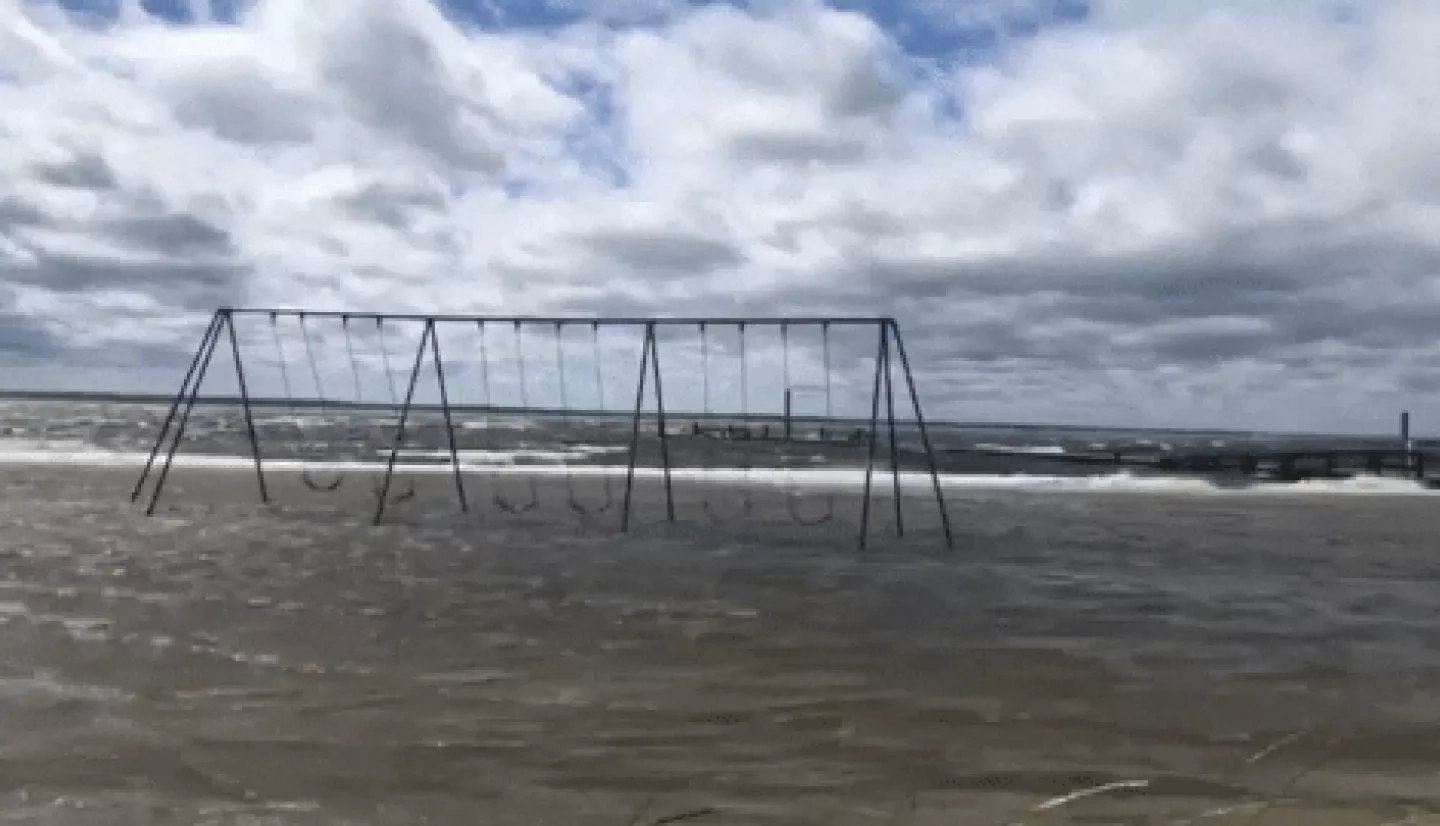 GIF of video of a swing set flooded