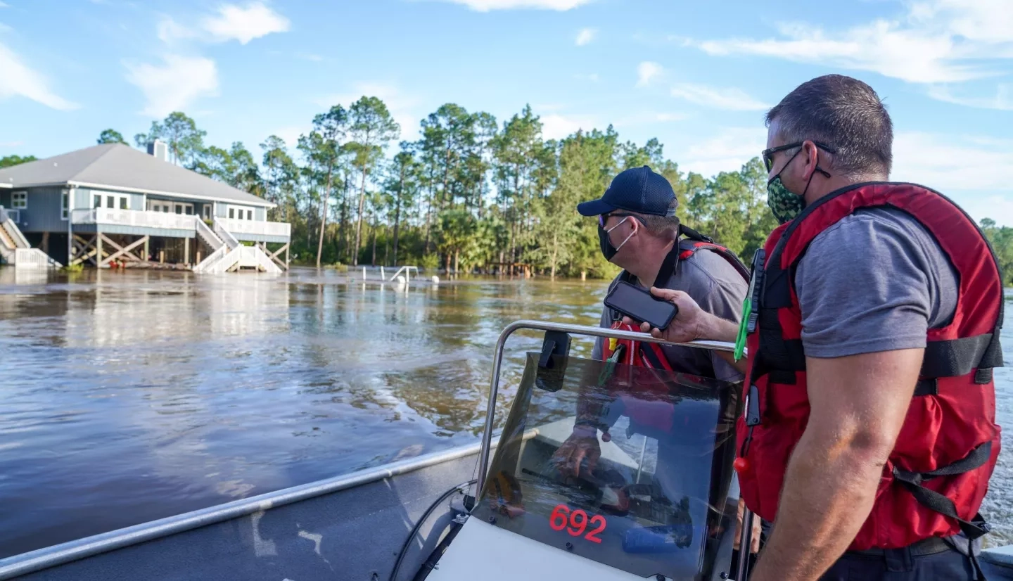 FEMA responders surveying flooded areas. Credits: FEMA