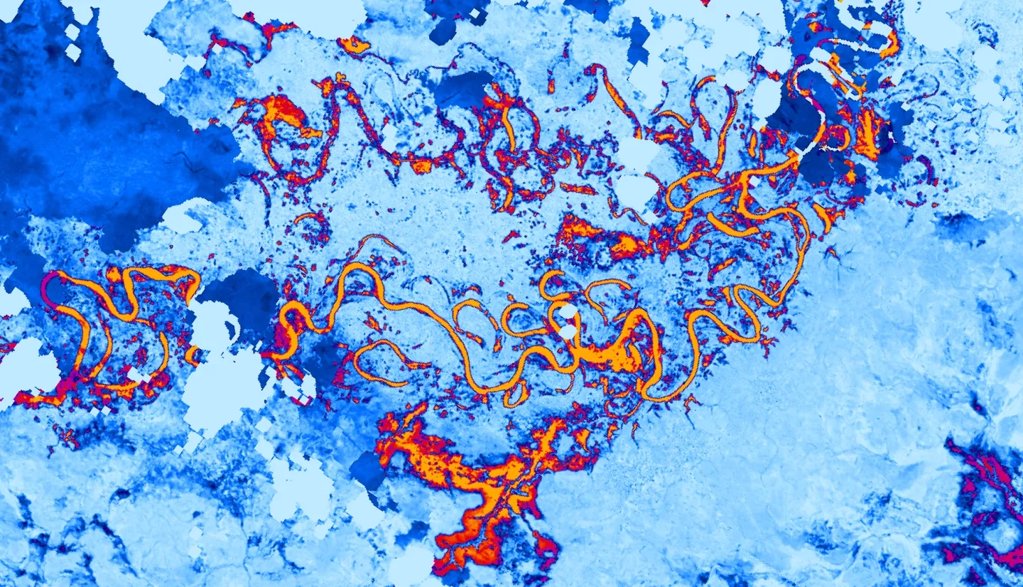 Landsat 8 OLI derived MNDWI imagery mosaicked from October 17, 2020, to December 2, 2020. Located near the Río Patuca (Patuca River) in Ahuas, Honduras, permanent water and flood is represented as bright red and orange while blue depicts other land cover types and clouds. Examining floods from disasters like Hurricanes Eta and Iota helps decision makers improve mitigation and response efforts.