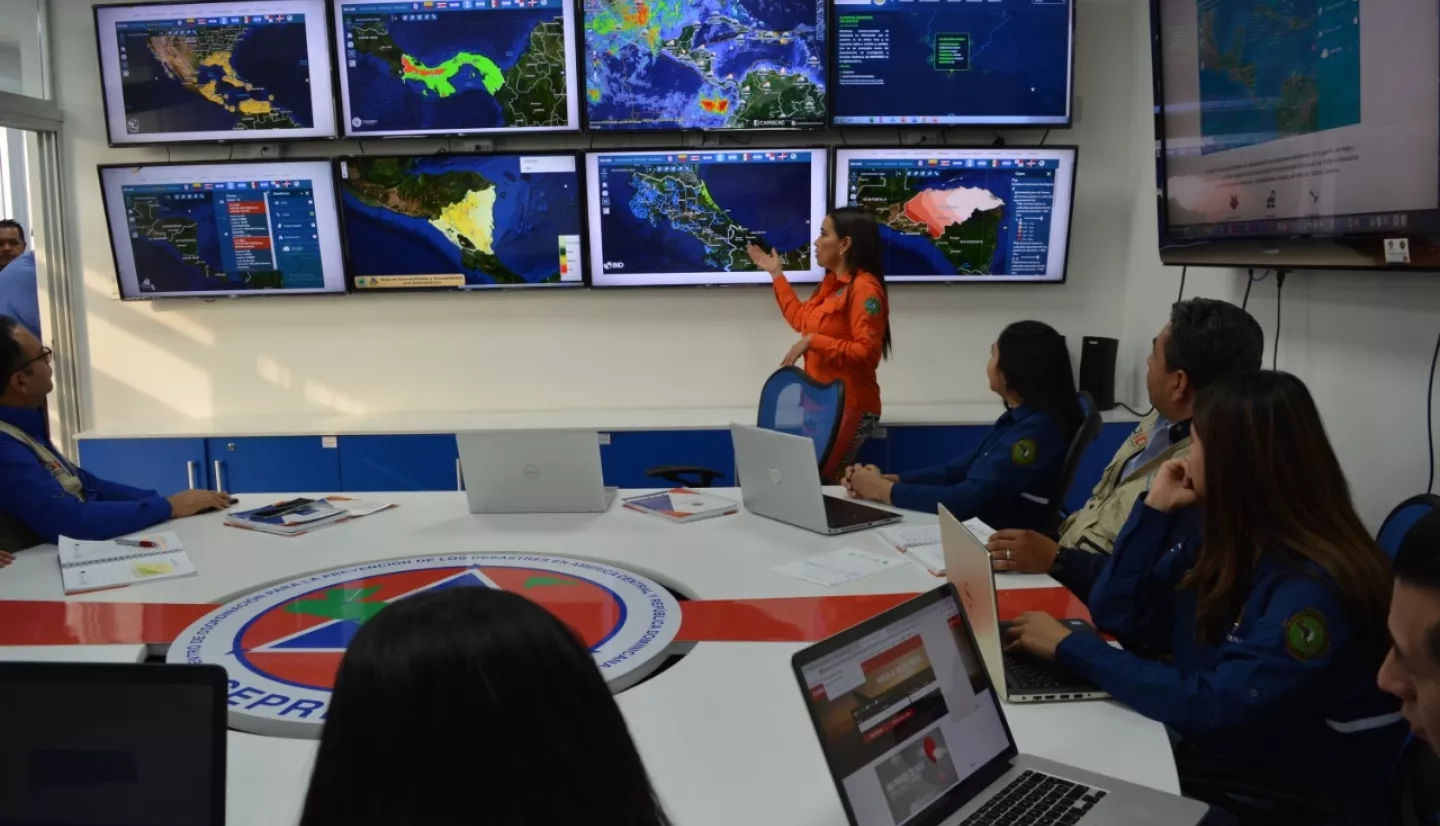 Disaster coordinators from the Coordination Center for Disaster Prevention in Central America and the Dominican Republic (CEPREDENAC) using NASA data to analyze potential impacts from Hurricane Iota. Credits: CEPREDENAC