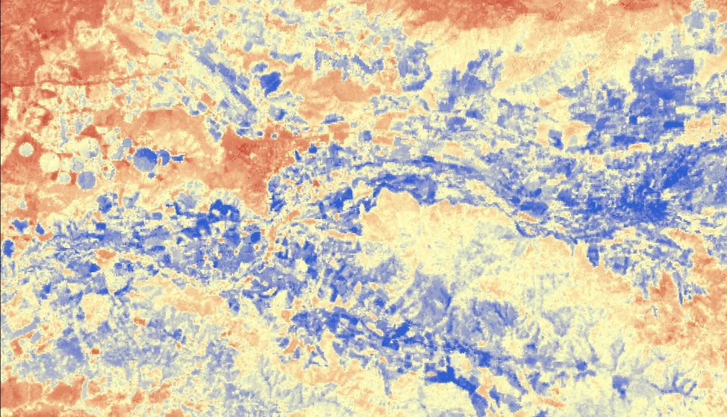 Median daily evapotranspiration (ET) from September 2021 to May 2022 calculated from ISS ECOSTRESS data. The image covers the agricultural fields adjacent to the Maipo River, Chile and depicts water stress. The color scale ranges from red (low ET) to blue (high ET), with higher ET observed over irrigated agricultural fields. ET is used for estimating crop irrigation requirements. This data will inform irrigation management practices and help alleviate water scarcity within the area.