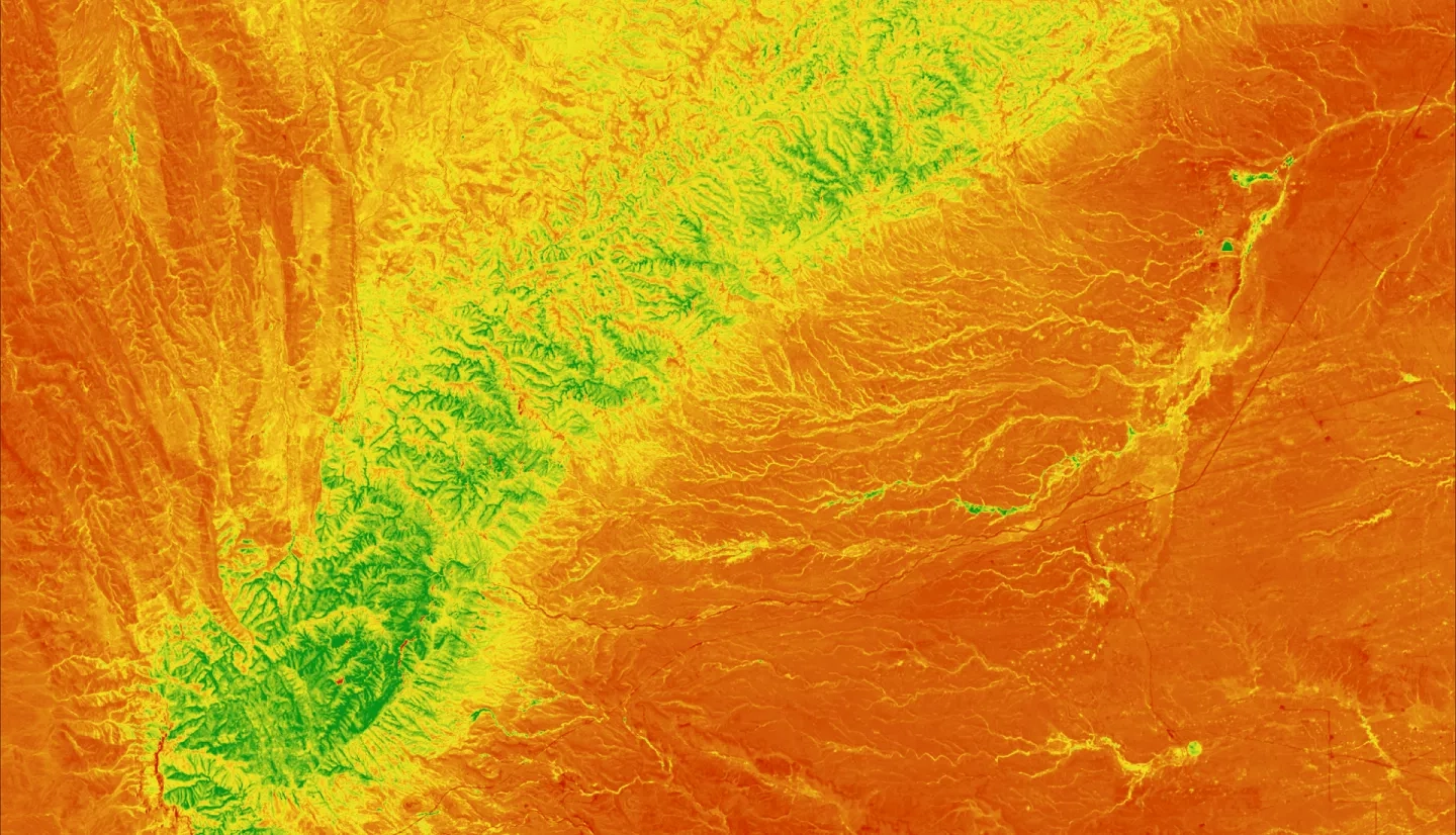 The image displays NDVI calculated over the Guadalupe Mountain Range in Western Texas captured in May 2020 by Landsat 8 OLI. Areas shaded green indicate tree canopy, while yellow and red areas indicate arid landscapes. NDVI was used to visualize vegetation health and inform the National Park Service’s future management initiatives.