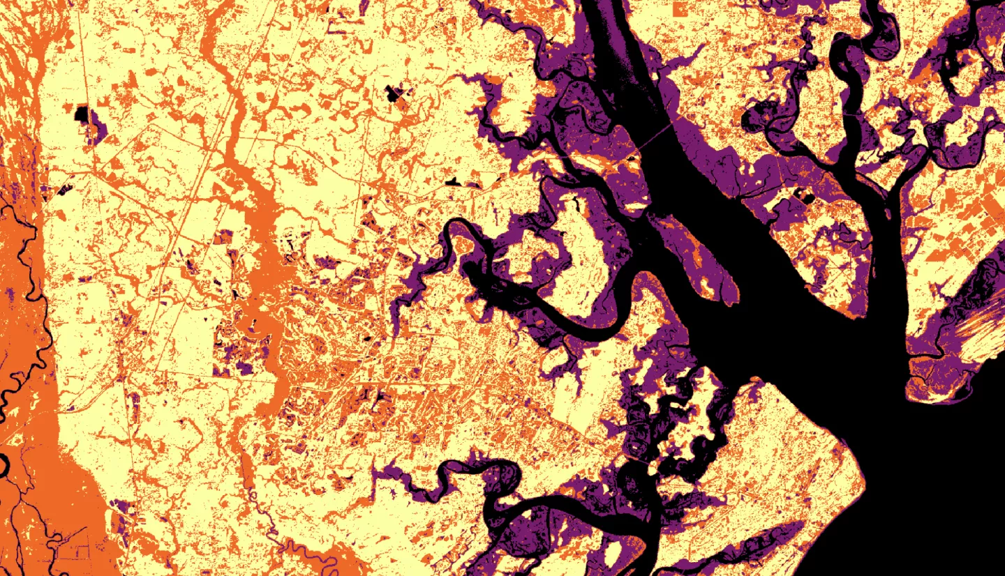 The image was collected by Landsat 9 on January 26 of 2023 showing Skidaway Island and waterways on the Georgia coast. The data shows areas of healthy vegetation and urban areas using a Normalized Difference Vegetation Index (NDVI). The darker orange represents grass and urban areas. Yellow and purple represents forested and densely vegetated areas. The black represents open water.