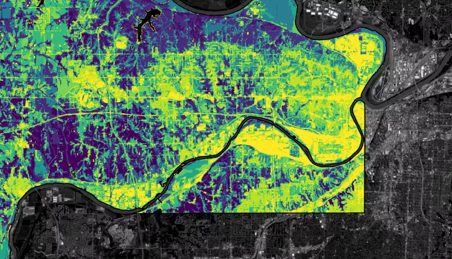 The InVEST urban flood model produces various outputs, like the runoff retention seen here. The model output was derived from GPM IMERG, land cover, soil type, and curve number data. This image is from the extreme rainfall storm event on August 22, 2017. This image shows where the runoff is being retained in Kansas City, KA. The dark purple represents extremely high runoff retention while the yellow represents low retention with the green and blue representing increasing amounts of retention. The background