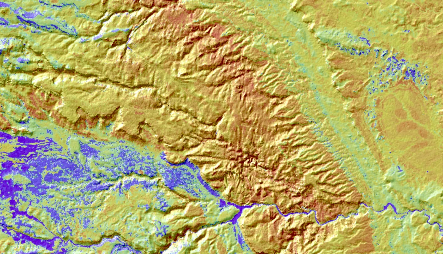 NDMI-index imagery from Landsat 8 OLI and SRTM data, taken on August 30, 2022. The image showcases vegetation water content in the northern part of Capitol Reef National Park. Blue regions indicate vegetation with higher moisture content, vital in semi-arid environments. In contrast, red and yellow regions suggest less hydrated vegetation. This image offers valuable insights into moisture dynamics in arid regions like Capitol Reef.