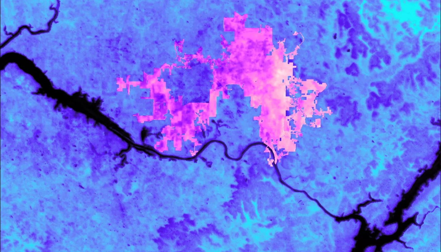 Daytime average land surface temperature over June 2022 from ECOSTRESS, an instrument on the ISS. Warm colors highlight the City of Huntsville, which is surrounded by central North Alabama. In both color gradients, darker colors represent higher temperatures. The Tennessee River, together with Wheeler Lake (left) and Lake Guntersville (right), appear black. Surface temperature is one factor that can help the local government decide where to focus tree-planting efforts to mitigate urban heat.