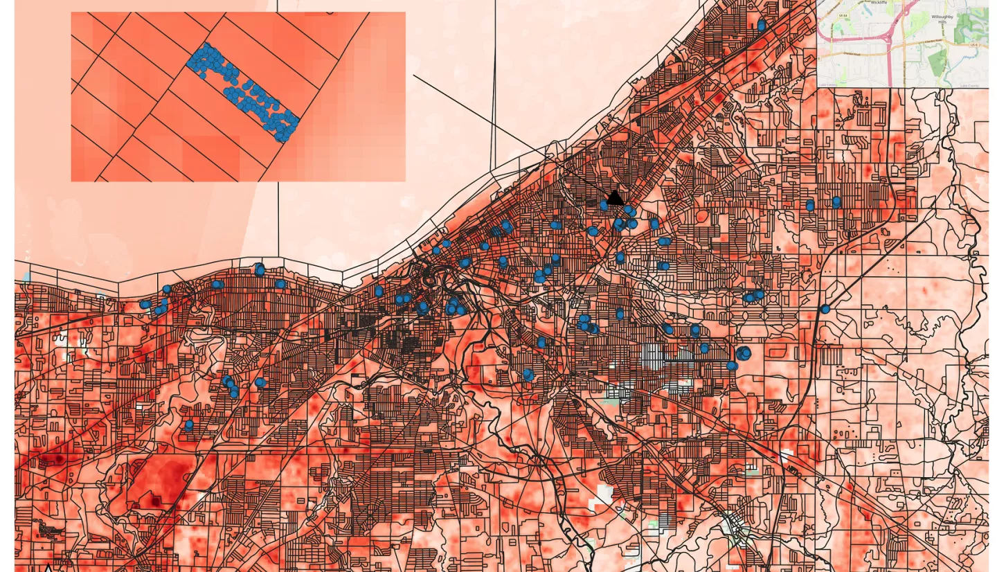 Land surface temperatures for study area (Cuyahoga County, Ohio), as derived from Landsat. Black lines show boundaries of census blocks. Blue dots show the greenspaces and census blocks where the on the ground tree surveys have been conducted, with one census block highlighted as an inset. Image Credit: Rob Moore (Cleveland State).