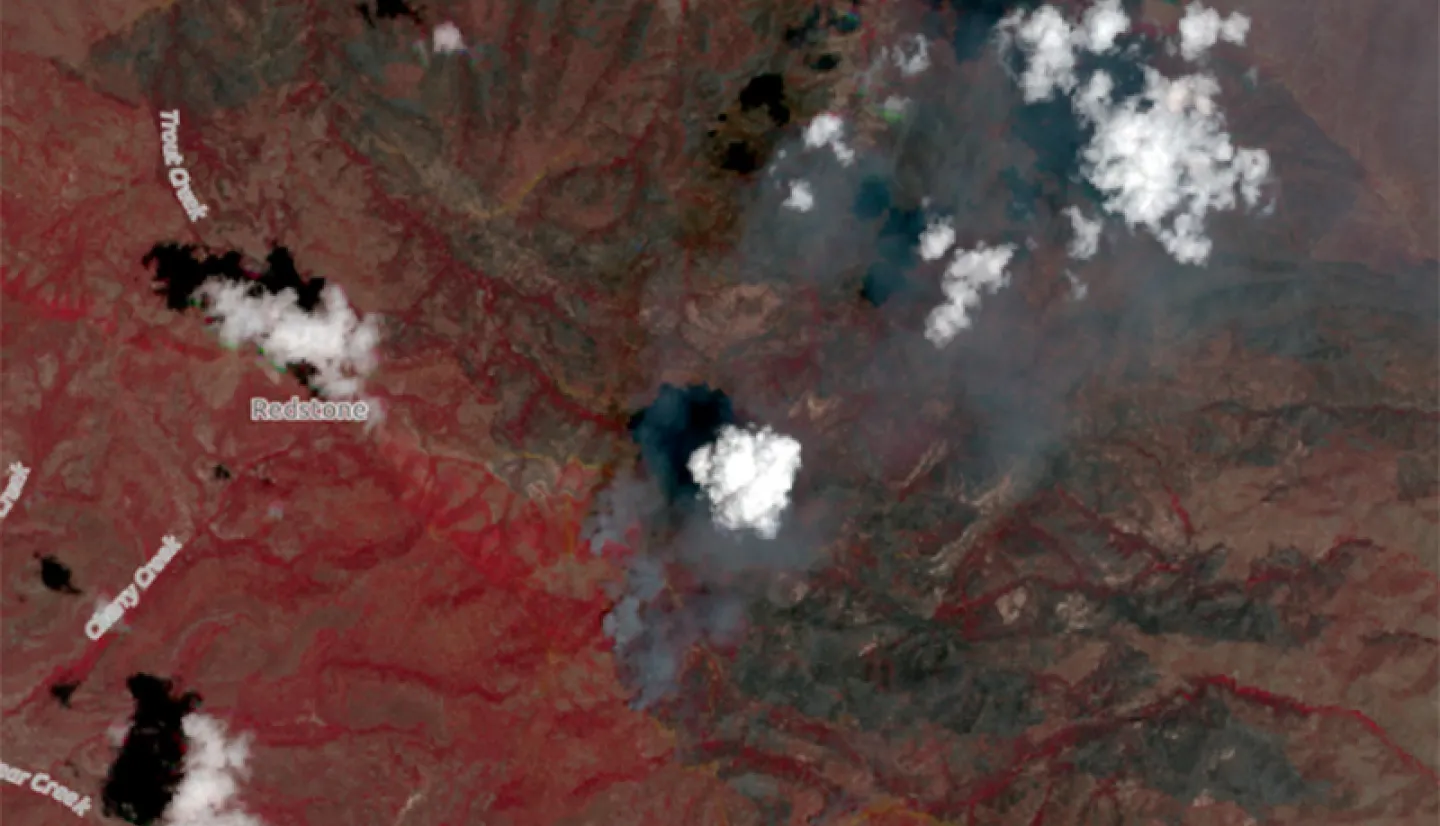 This Planet Scope imagery shows the burned area from the Trout Fire, one of the ongoing wildfires in New Mexico. This Color Infrared composite was created on June 20, 2025, using the near-infrared, red, and green channels, allowing for the ability to see areas where vegetation has been damaged by fire. The near-infrared capability provides the ability to see through thin clouds. Healthy vegetation is shown as red, water is in blue, and burn scars appear black or brown.