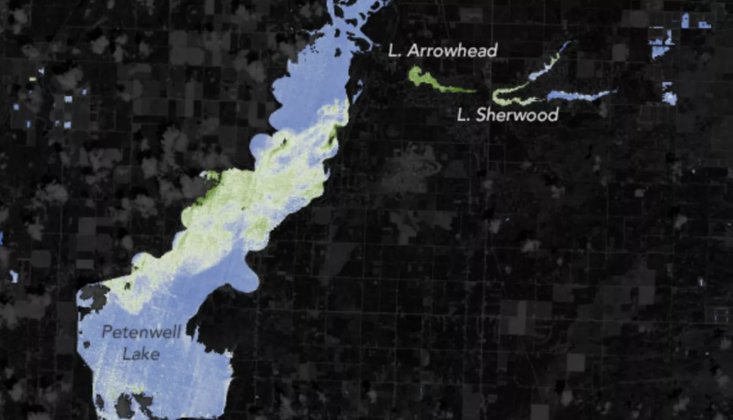 satellite image showing an algae bloom on a lake
