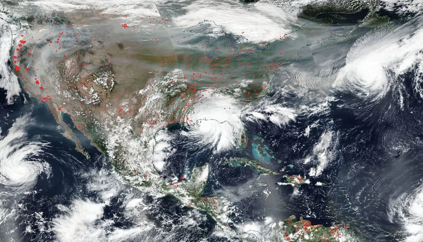 NASA's Aqua satellite captured this true-color image of the United States on Sep. 15, 2020, showing the fires in the West, the smoke from those fires drifting over the country, several hurricanes converging from different angles, and Hurricane Sally making landfall. Credit: NASA 