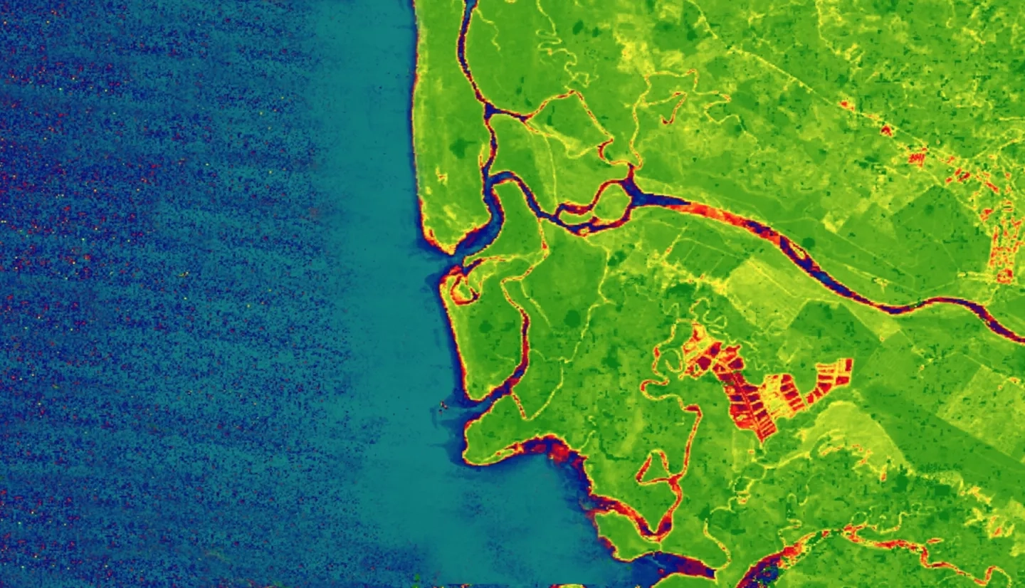 Greenest pixel composite of Normalized Difference Vegetation Index (NDVI)-processed image using 2019 data from Landsat 8 Operational Land Imager  blended with a true color band combination (3, 2, 1) of the Western coast of Costa Rica in the Osa region. The areas of highest vegetation are represented in green, areas of lowest vegetation are represented in red, and water is represented in blue. The land cover characteristics shown in an NDVI image improve land cover classification accuracy.  Keywords: NDVI, Landsat, land cover