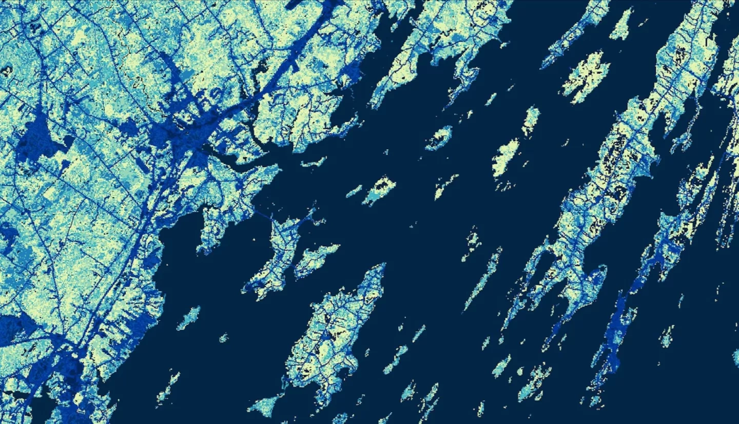 Above is a supervised land cover classification image using a mosaic of July 12, 19, and 28, 2018 Landsat 8 OLI data of Cumberland County, Maine. The shores of Yarmouth, Harpswell, and Chebeague Island are displayed. Scaled urbanization is shown with lighter blues indicating the most vegetated areas and darker blues indicating the most impervious urban areas. Navy blue represents water. Identifying the land cover type allows for better understanding of tick encounter risk.