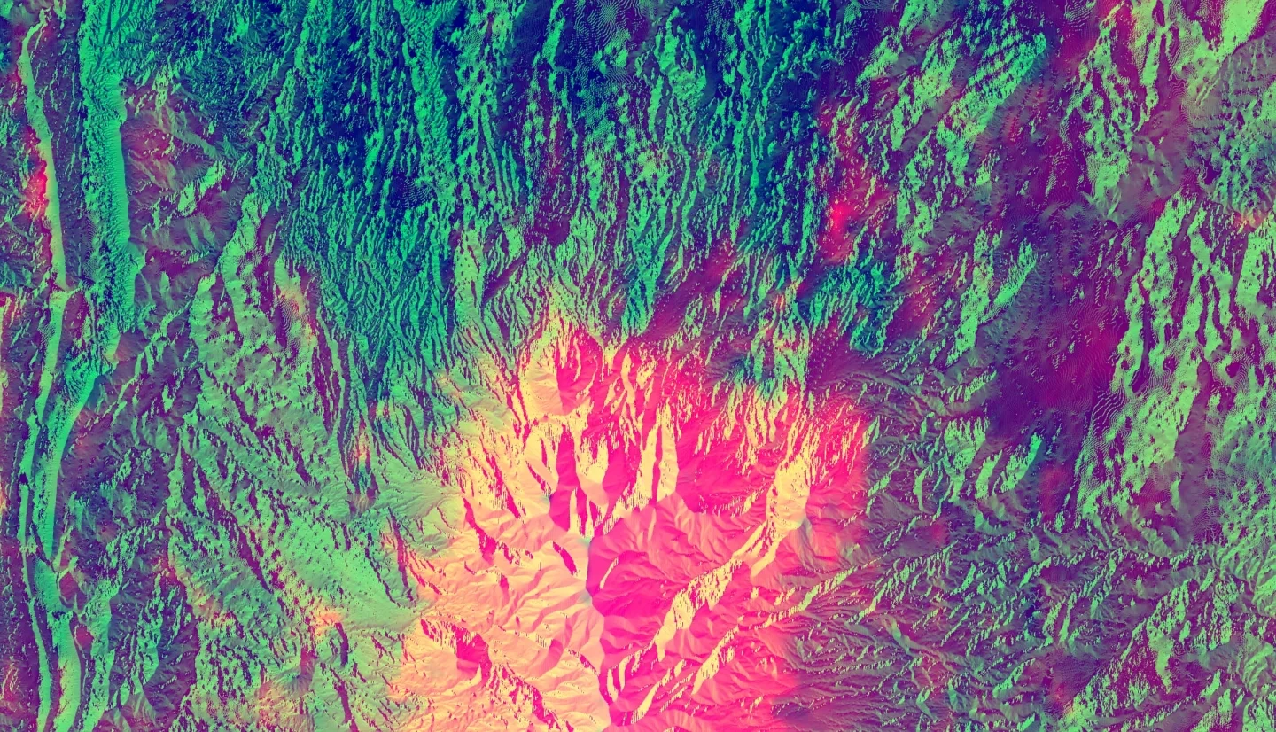 NDVI processed imagery from Suomi-NPP VIIRS in late June 2019 composited with elevation and aspect from the NED. The Henry Mountains in southern Utah are displayed. The lighter yellows and pinks indicate higher elevations and greater vegetation concentration where darker colors, including green and blue, indicate lower elevations and areas concentrated with less vegetation. Areas with higher vegetation indices indicate higher live fuel moisture content which aids decision-makers in allocating resources before and during wildfires.  Keywords: NDVI, aspect, elevation, live fuel moisture, Gavin Pirrie, Helena Bierly, Avery King, Katherine Mistick