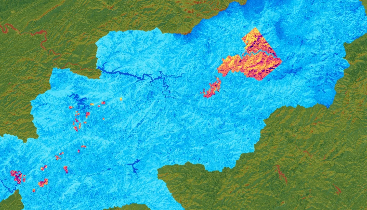 Winter 2018-2019 Landsat 8 OLI-derived spectral indices used to investigate suitability of hemlock trees for the Eastern Band of Cherokee Indians (EBCI). EBCI owned land tracts are shown in a yellow-purple gradient representing Normalized Difference Built-Up Index, watersheds encompassing EBCI land are shown in a blue gradient representing Normalized Difference Moisture Index, and the surrounding study area is show in a red-green gradient representing NDVI and the leaf-on greenness of evergreen forest stands in winter.   Keywords: hemlock, evergreen, NDBI, NDVI, NDMI, EBCI, Landsat 8 OLI​
