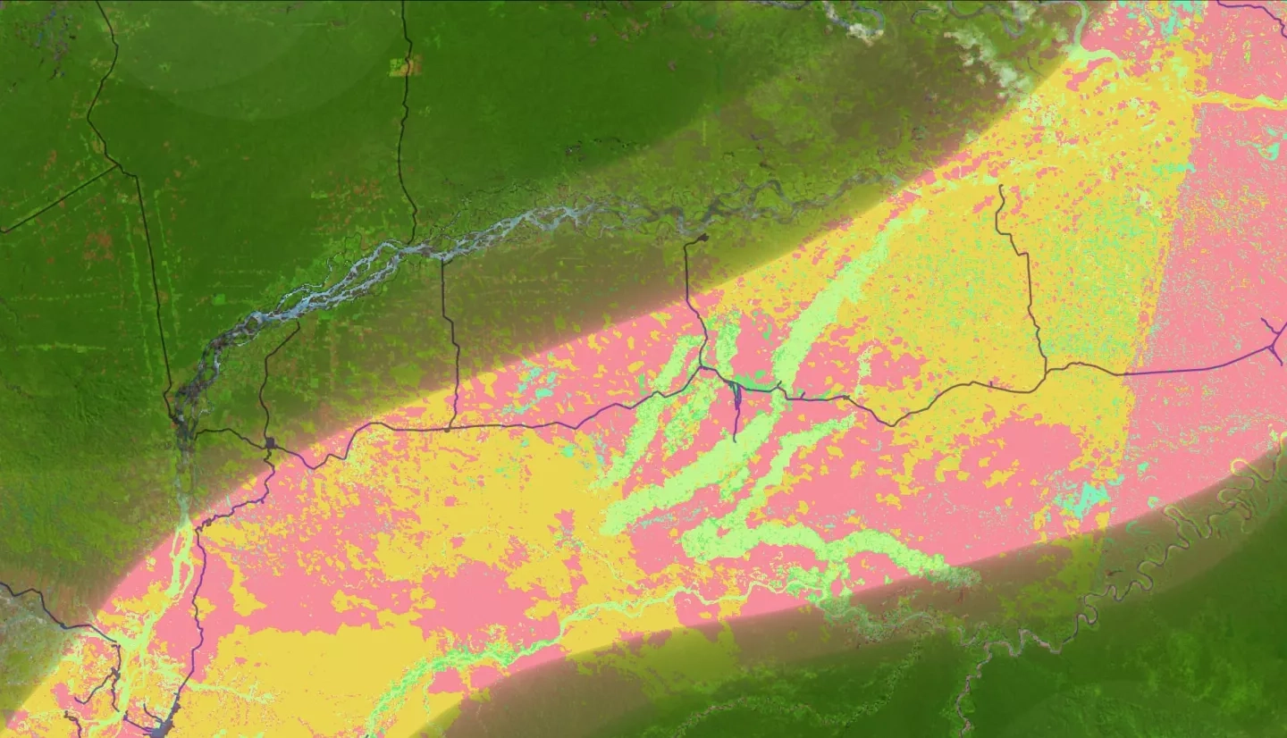 Land use classification imagery using 2020 Landsat 8 OLI data, blended with a false color band combination (6,5,4), with the highway system overlayed in dark blue. Pictured is the Madre de Dios region of Peru, centered around the La Pampa illegal mining site. The light green indicates areas of gold mining, areas in pink represent wetlands, and areas in yellow represent forest cover. Tracking land use change allows agencies to understand where deforestation is occurring.  Keywords: Nelson Huffaker, Oliver Nguyen, Elizabeth Stapleton, Ariel Calle, Nataly Chacon