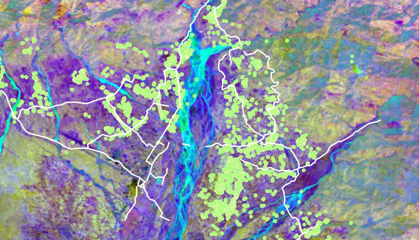 2020 Landsat 8 OLI data processed using principal component analysis with a band combination of 2, 3, and 9. Human settlements and roads are indicated by the green dots and white lines, respectively. The area displayed is the town of Gelephu along the southern border of Bhutan. Different colors represent different land cover types. This will provide information on land change trends which will assist partners in urban planning and allocation of wildlife corridors.  Keywords: remote sensing, Asian elephant habitat, Bhutan, LULC change mapping, LULC change forecasting, wildlife corridor mapping