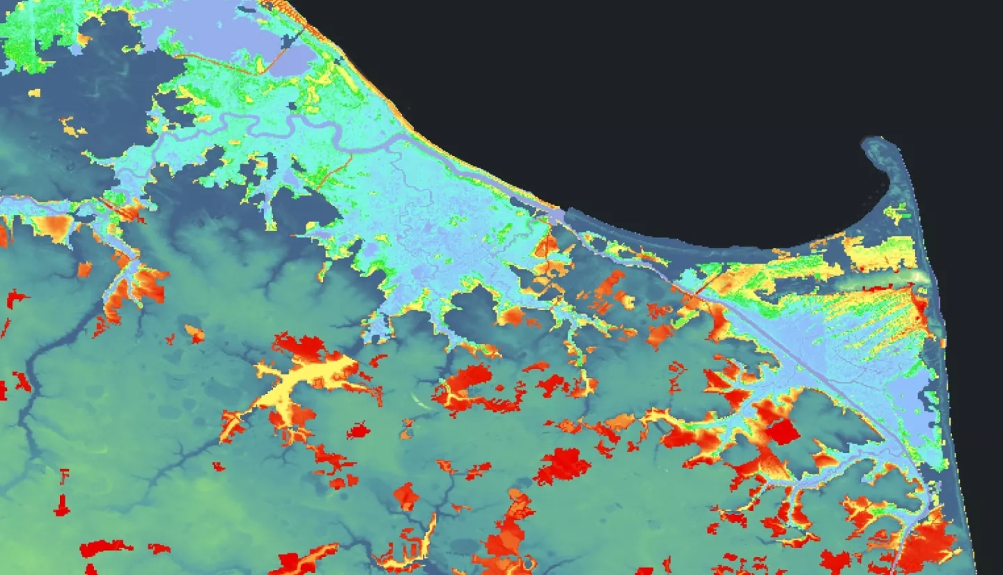 Likelihood of transition from wetland to other land cover by 2050, based on wetland loss patterns from 2010 Landsat 5 TM and 2020 Landsat 8 OLI imagery. Areas with highest likelihood of loss on the Eastern shore of Delaware are shown in red, with those likely to persist in light blue. A LiDAR Digital Elevation Model (2013-2014) indicates low elevation in dark blue. Predicting wetland trends allows local stakeholders to prioritize management of wetland areas.  Keywords: Delaware, Landsat, wetlands, marsh