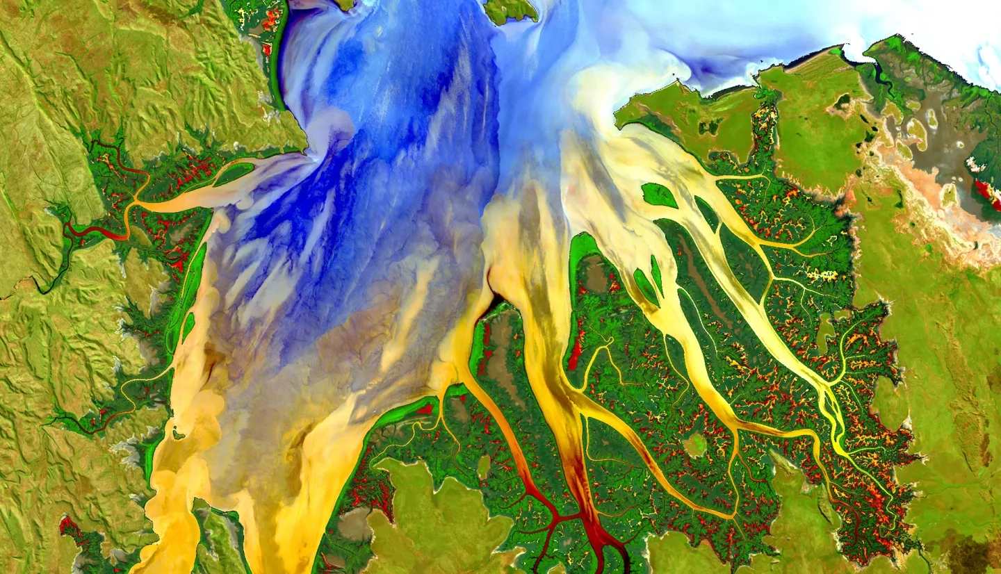 This image, captured by the Landsat 8 satellite, shows the view over Western Australia on May 12, 2013. The image shows rich sediment and nutrient patterns in a tropical estuary area and complex patterns and conditions in vegetated areas. Credits: NASA/USGS Landsat; Geoscience Australia