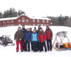 Jennifer Jacobs and team in the field for CRUSTEx snow experiment, equipment includes radiometers. 