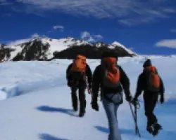 Image of hikers in the snow, cover of capacity building report 