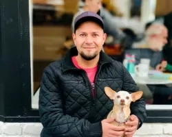 Photo of Alberto Guzman and his dog