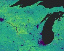 Terra MODIS-processed imagery using version 6 MOD16A2, calculated by averaging monthly evapotranspiration data from 2001 to 2020. This image includes several central Midwestern states along the Great Lakes. The lighter green areas indicate high levels of evapotranspiration affecting the water budget and health of agriculture while the purple areas represent no data values consistent of urban landscapes with impervious surfaces or large bodies of water. 