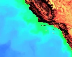 This image depicts chlorophyll-a concentrations along the Southern California Coast during a Harmful Algae Bloom, also known as a Red Tide Event. The ocean imagery was taken in April of 2020 by Aqua MODIS and used to generate chlorophyll-a concentration. The land imagery was taken by Sentinel-2 MSI during the same time period, and a Normalized Difference Chlorophyll Index was applied to it for visualization purposes. Blue and green indicates high and low chlorophyll-a concentrations, respectively. On land, 