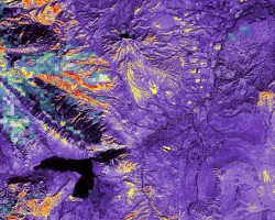 Normalized Difference Snow Index (NDSI) processed image using Landsat 8 OLI data from January 2022 and SUOMI-NPP VIIRS snow cover data from January 2019, overlaid on a Landsat 8 RGB image, colorized purple. NSDI is shown in yellow-orange-red and SUOMI-NPP VIIRS is depicted in shades of blue. Snow cover data was used to identify melt events causing high turbidity in Wyoming’s Shoshone River basin. PlanetScope-derived turbidity (May 2019) also highlights the river in green.
