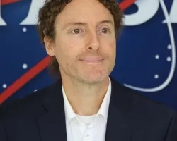 Sean Pictured in front of the original NASA logo