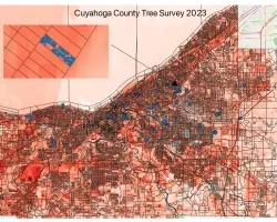 Land surface temperatures for study area (Cuyahoga County, Ohio), as derived from Landsat. Black lines show boundaries of census blocks. Blue dots show the greenspaces and census blocks where the on the ground tree surveys have been conducted, with one census block highlighted as an inset. Image Credit: Rob Moore (Cleveland State).